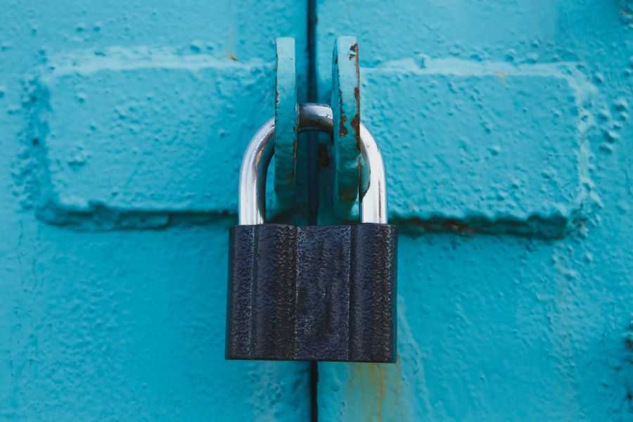 Padlock on blue door